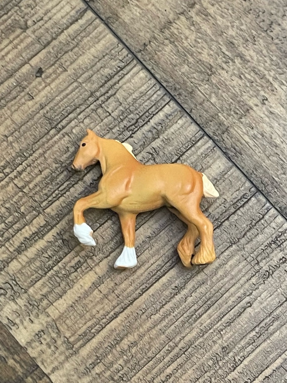 Breyer Mini Whinnies "High Stepping Draft Horse" in the Palomino coloration